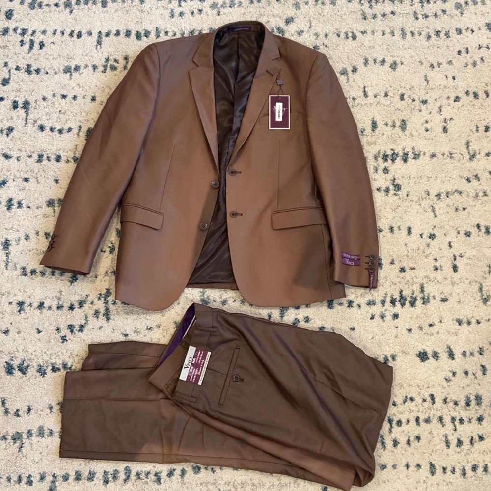 NEW men’s dress suit with issues.
